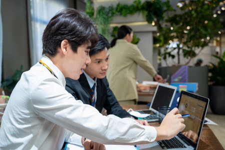 Asian business staff group present and working together,Kindly supervisor train new staff in office.の写真素材