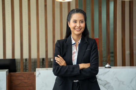 Female hotel receptionist,Portrait of hotel staff at lobby hotel.の写真素材
