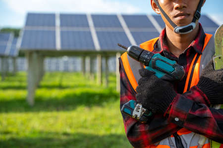 Engineers checking and maintenance equipment at industry solar power,Solar Energy,Clean...
