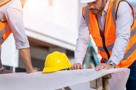 Safety helmets for workplace construction,The safety helmet at construction site with construction...