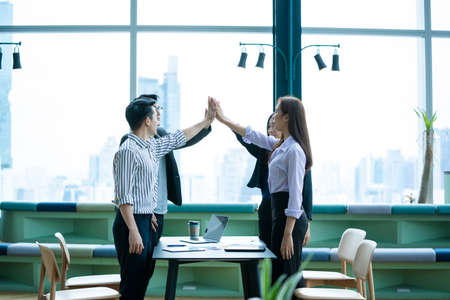Group of business people joining hand together for making a deal after successful meeting,Unity and teamwork concept.の写真素材