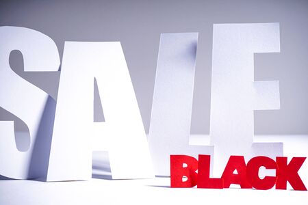 Black Friday sale in white letters on a gray background with red letters Black. Black Friday sale, fall, promotion advertisingの写真素材