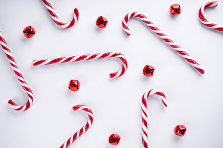 Christmas concept. Christmas candies with red balls, on a white background. Flat lay.の写真素材