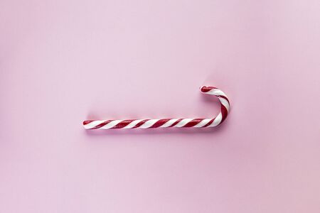 Christmas concept. Christmas candy on pink background. Flat lay.の写真素材
