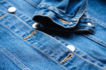 Womens blue jean jacket close-upの写真素材
