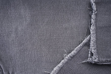 Denim pattern, gray jeans background, place for text. Jeans texture.