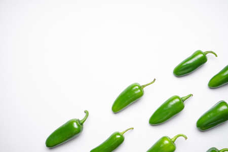 Jalapeno chili peppers, on a white background, space for text.の写真素材