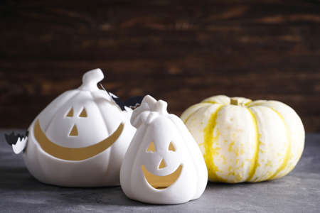 Halloween pumpkins and bats on a wooden background. Close-up.の写真素材
