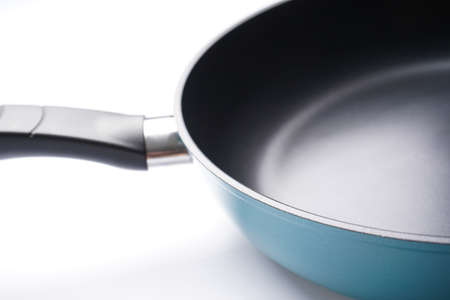New frying pan on white background, Close-up.の写真素材
