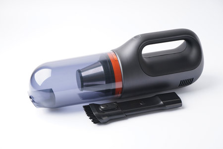 The cordless car vacuum cleaner, isolated on white background.の写真素材