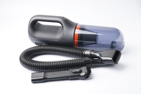 The cordless car vacuum cleaner, isolated on white background.の写真素材