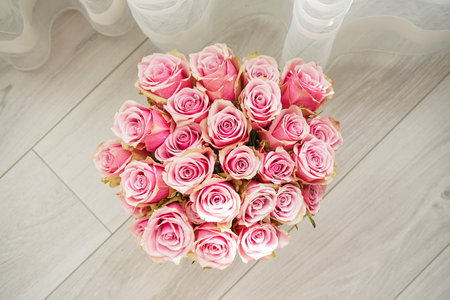 Bouquet of pink roses. Beautiful, bright floral background. top view.の写真素材