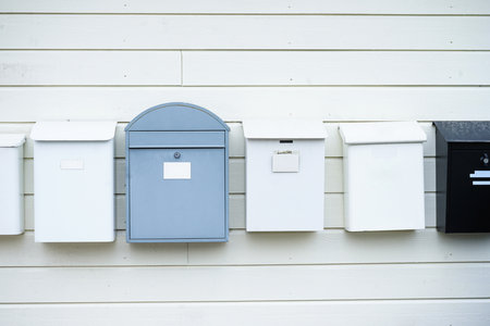 Urban postal infrastructure for receiving letters and parcels. Concept of communication, delivery, and modern housing.の写真素材