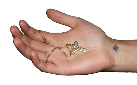 a religious cross in Hand isolatedの写真素材