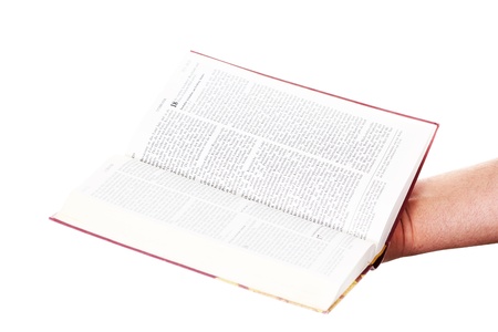 Praying hand hold an open bibleの写真素材