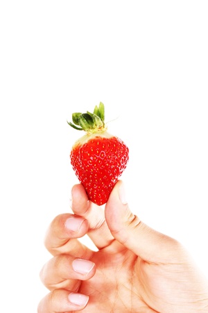 hand holds Strawberriesの写真素材