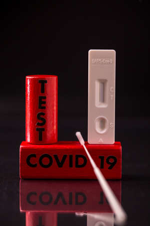 coronavirus covid-19 face mask with black background and lettering
