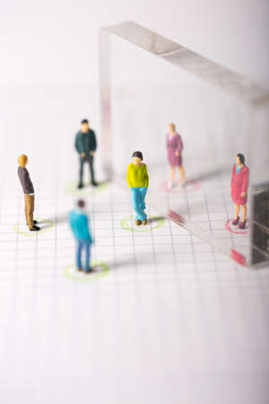 Social distancing, people keeping distance to protect COVID-19 coronavirus outbreak spreading concept, miniature keep distance each otherの写真素材