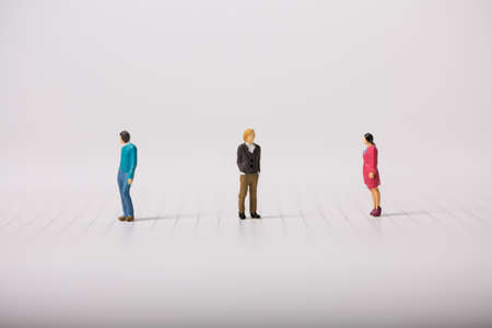 Social distancing, people keeping distance to protect COVID-19 coronavirus outbreak spreading concept, miniature keep distance each other.の写真素材