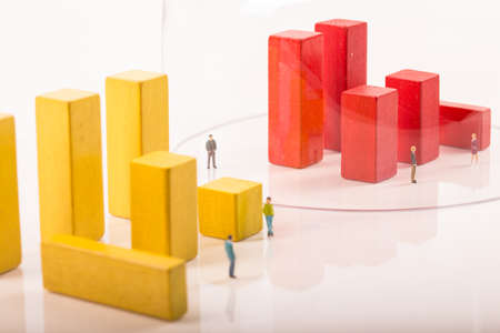 Social distancing, cities and countries divided into yellow and red zone, restricted area. People keeping distance to protect COVID-19 coronavirus outbreak spreading concept, miniature keep distance each other.の写真素材