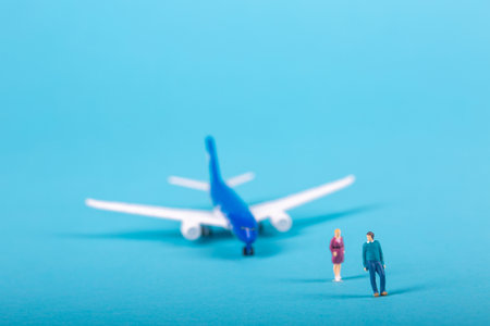 Travelers close to an airplane