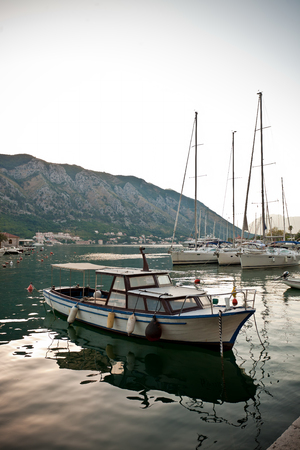A small boat in marine at sunset.のeditorial素材