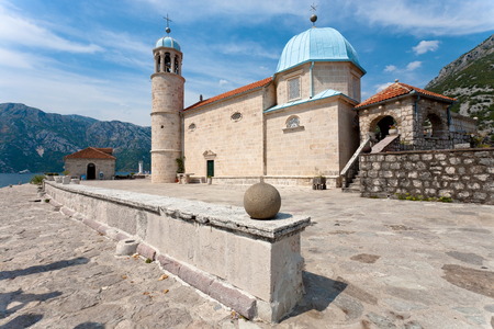 Old medieval church on the island at Perast, Kotor Bay, Montenegro. Famous touristic destination.の写真素材