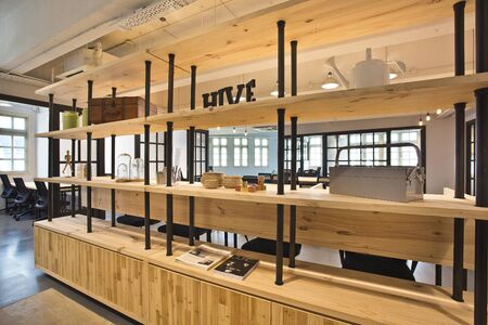 this is photo of interior design with long wood and black pillars with best quality and high...