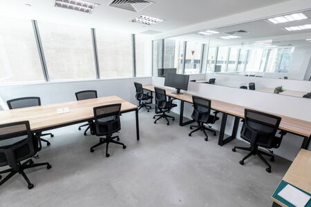 this is photo of interior design of office space with black chairs and white windows with best quality and high resolution for you.の写真素材