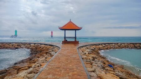beach with rocks and seated templesの写真素材
