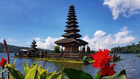 Temple on the lake with clear skyの写真素材