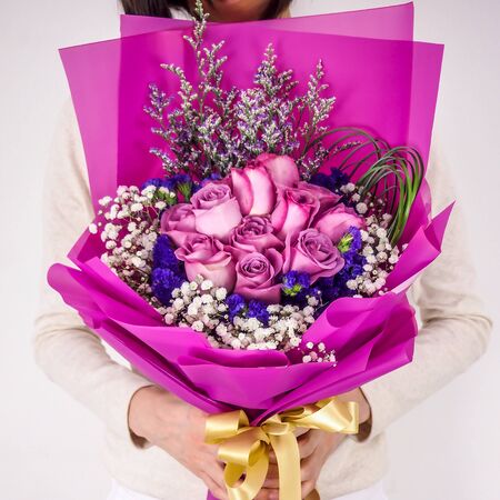 lots of purple flowers with beautiful wrappersの写真素材