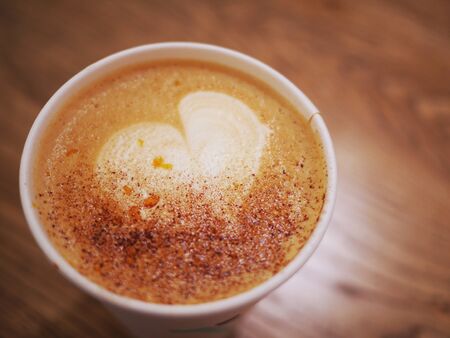 Coffee milk with a beautiful shape in a cupの写真素材