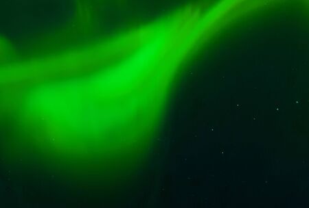 the background of abstract galaxies with stars and planets with green aurora motifs of the universe...