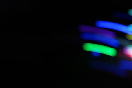 Abstract blur light background.green and light blue decorating light.abstract light.Beautiful green and light blue on blackの写真素材