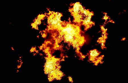 Blazing yellow and orange fire over Abstract orange smoke hookah on a black background
