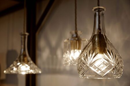 White lamps decoration Stacked on a light background on Wood wallの写真素材