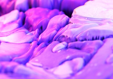 Neon colorful purple and white hot explosion liquid paint and Decorative bright texture fluid cloud blue backgroundsの写真素材