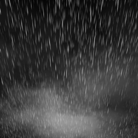 gray rain overlay isolated realistic rain visual effect on black night abstract backgroundの写真素材