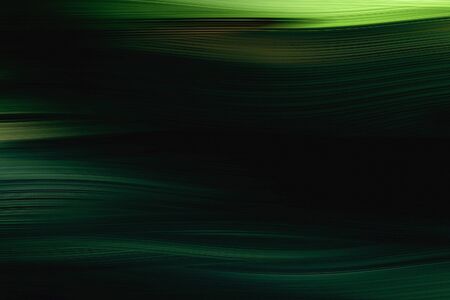 dark green colored smooth abstract background and motion blurred light background and gradient...
