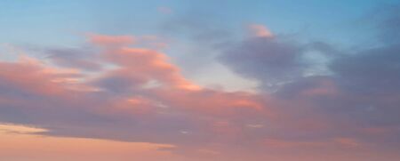 orange sky and sunrise colored wide sky and gradient and white cloud texture and striped abstract...