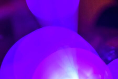 purple and blue neon light abstract Neon bright lens flare colored on black background.dark abstract...