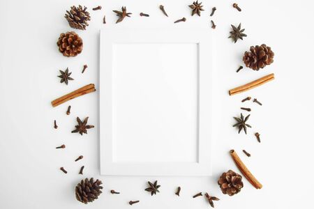 white background and dark circle Modern frames desk home decoration with frame photo and mock up white frame and dry twigs in vase on book shelf or desk in white roomの写真素材