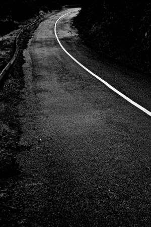 black and white in the road track beautiful Road turning in the hills and Mountain road grassland...