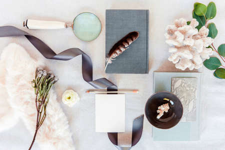 many note and stationary in white background white pastel desk christmas composition and Female home...