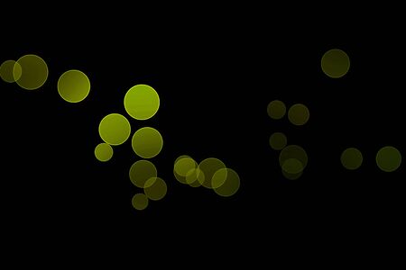 light green blur effect black background.abstract black unfocused blur light dots black background.