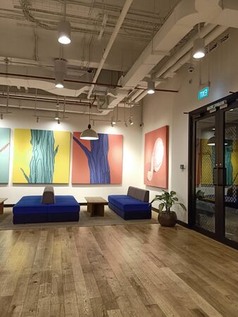 modern co working space with blackboard, desk, computer,table cozy loft office interior on...