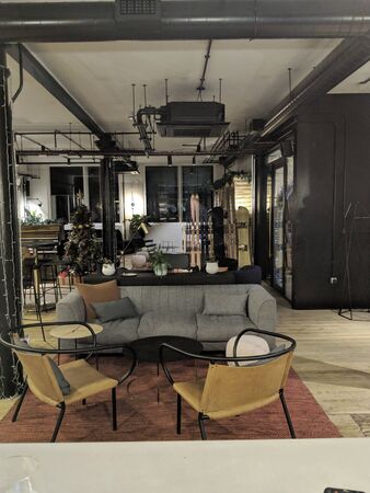 modern interior co working space design with brown chair,table table, background.Contemporary co...
