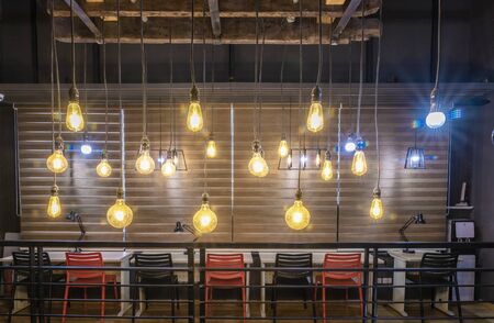 co working space modern style room with red and black chair,black table stylish room with soft lamp...