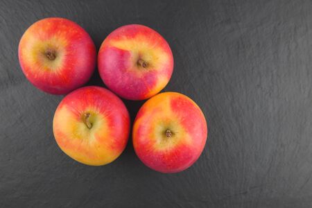 green and red apple fresh fruit in row isolated assortment clipping pat on white and black...